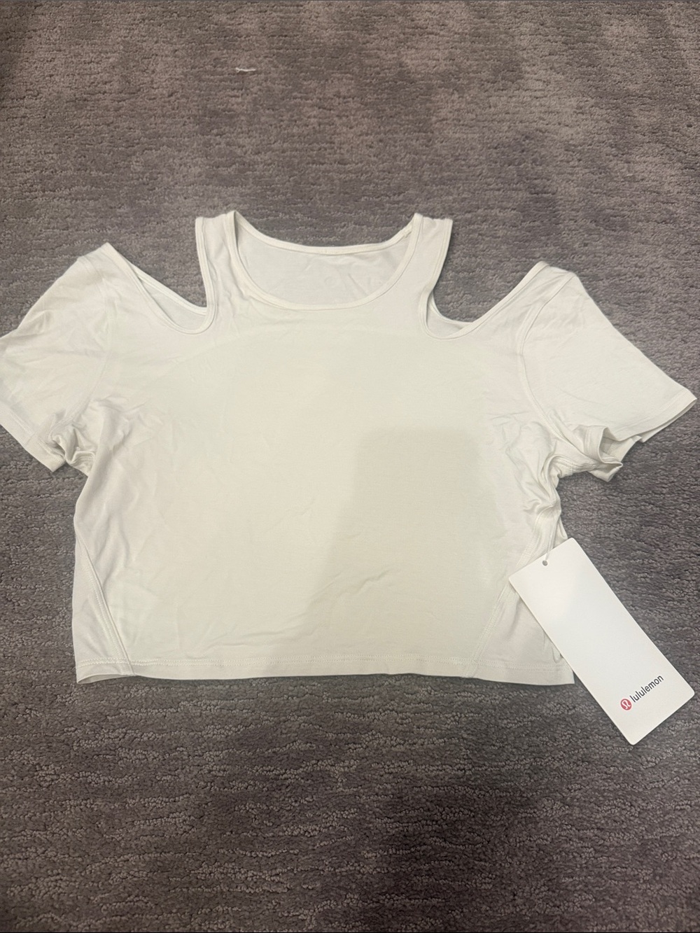 Authentic Lululemon shoulder cut out yoga top size 8 .New